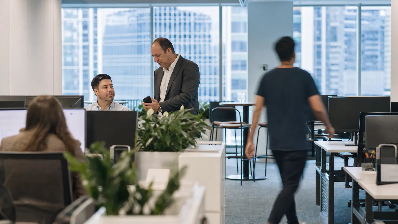 An advice team at work in a busy city office